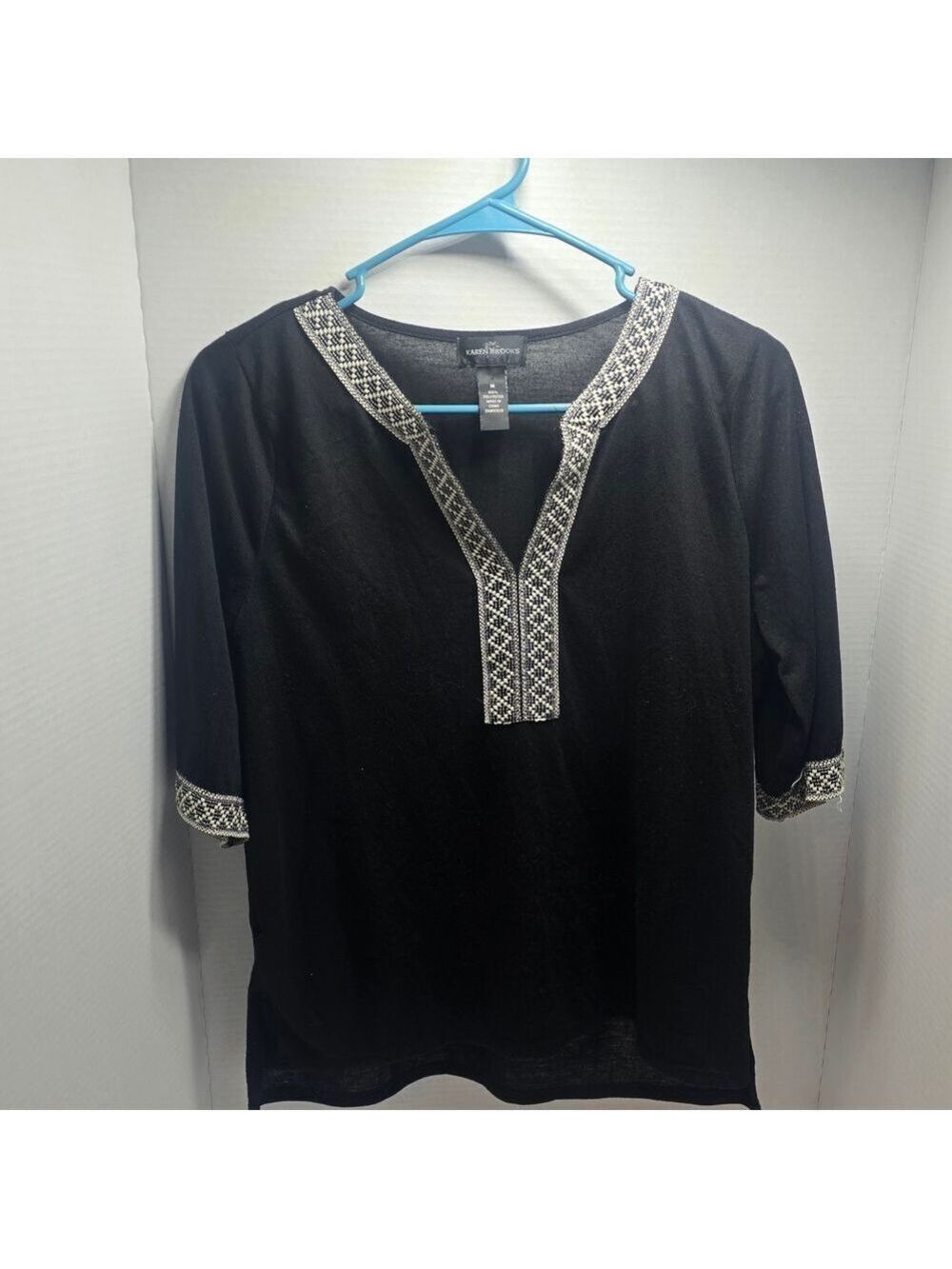 Stylish Black Blouse with Embroidered Accents